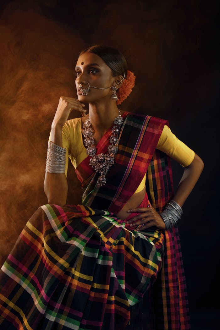 Captivating portrait of an Indian woman in traditional saree, showcasing cultural elegance and style.